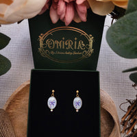 Boucles d'oreilles noeuds parmes