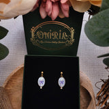 Boucles d'oreilles noeuds parmes