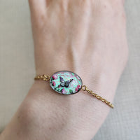 Bracelet papillon aux fleurs