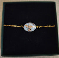 Bracelet Chouette Errol sur fond bleu ciel
