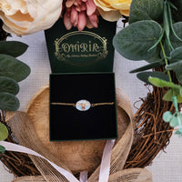 Bracelet Chouette Errol sur fond bleu ciel