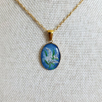Muguet sur fond bleu