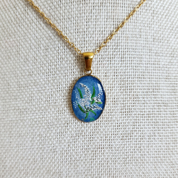 Muguet sur fond bleu
